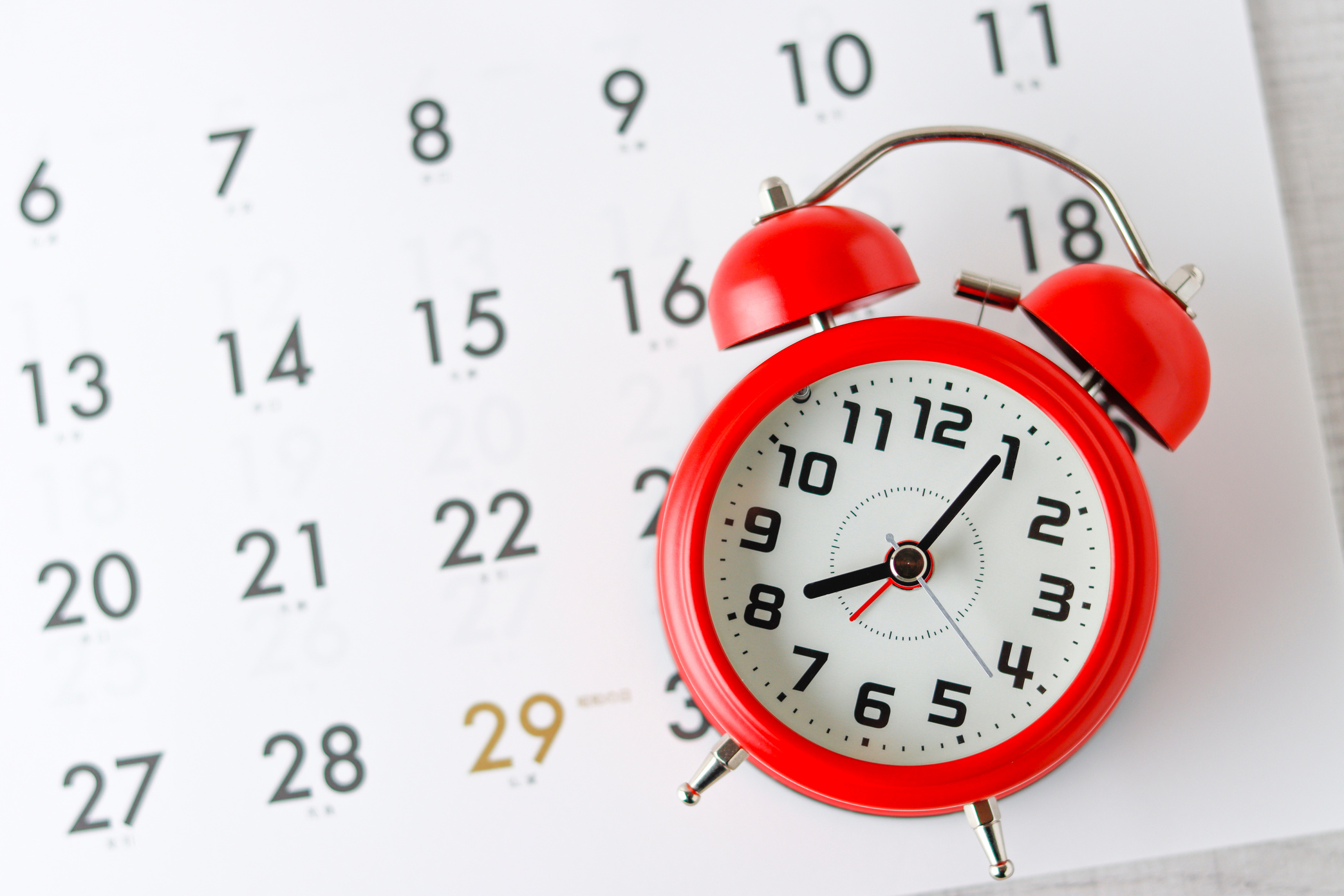 Red alarm clock and calendar