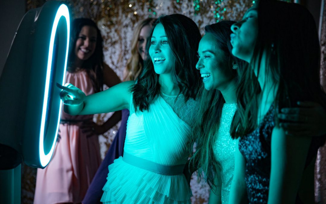 Guests enjoying the photo booth at Regency Party Hall Queens Village